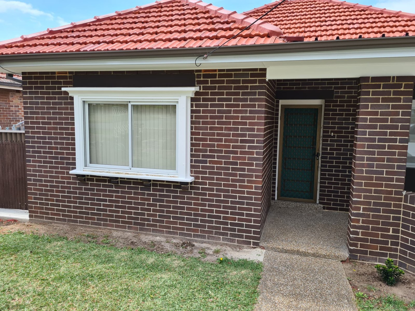 Exterior wall cleaning before and after