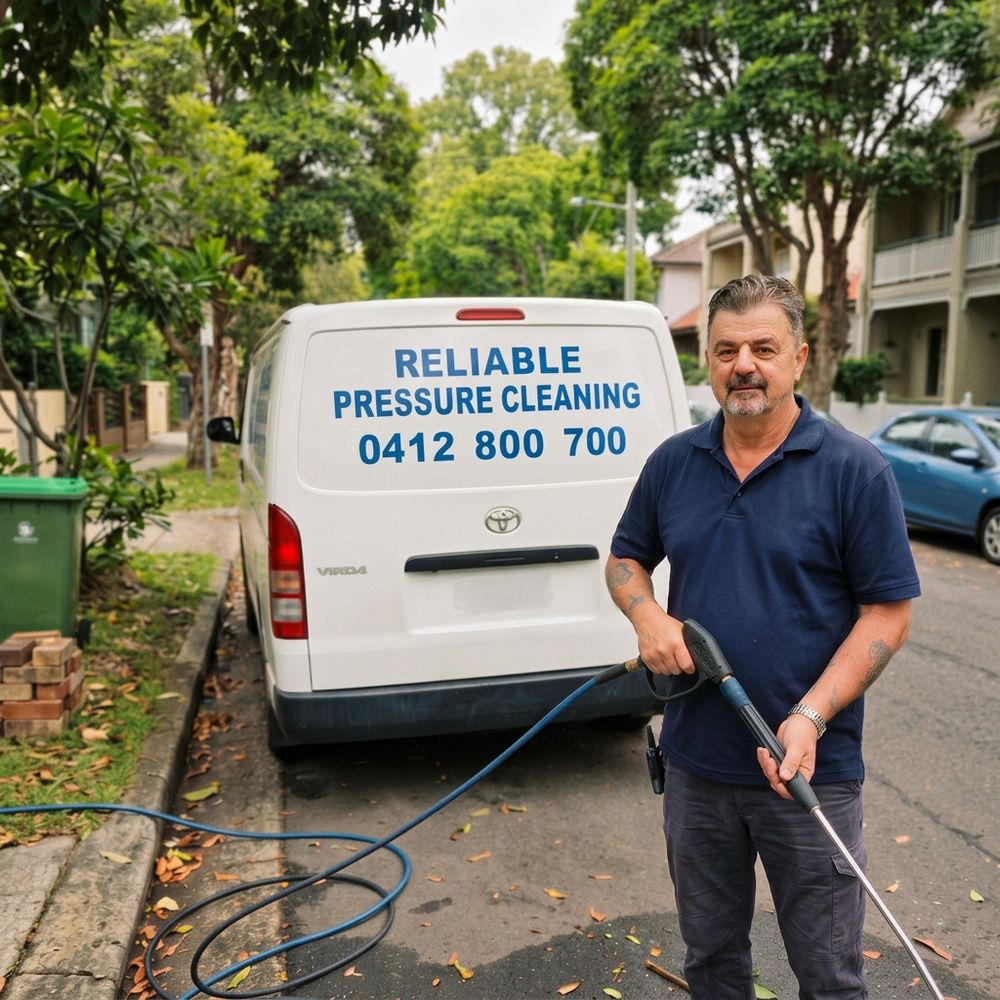 Lucky, owner of Reliable Pressure Cleaning, standing in front of his Sydney pressure washing van